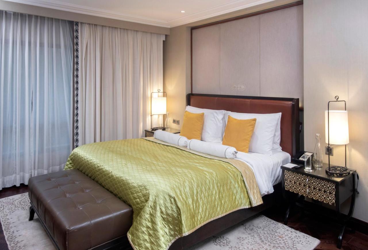 โรงแรมเดอะคลาริดจ์ส นิวเดลี ภายนอก รูปภาพ A bedroom at the Taj Bengal
