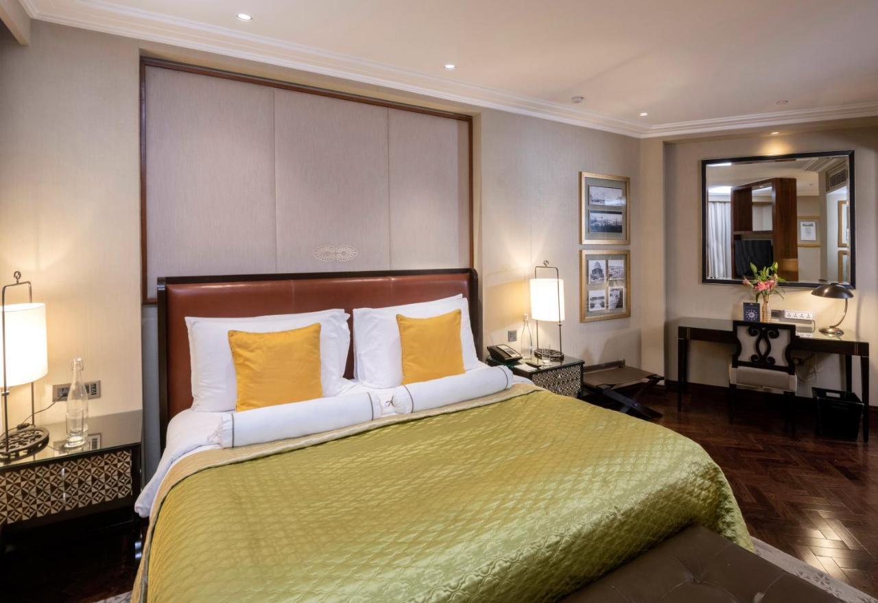 โรงแรมเดอะคลาริดจ์ส นิวเดลี ภายนอก รูปภาพ A room at the Taj Mahal Palace
