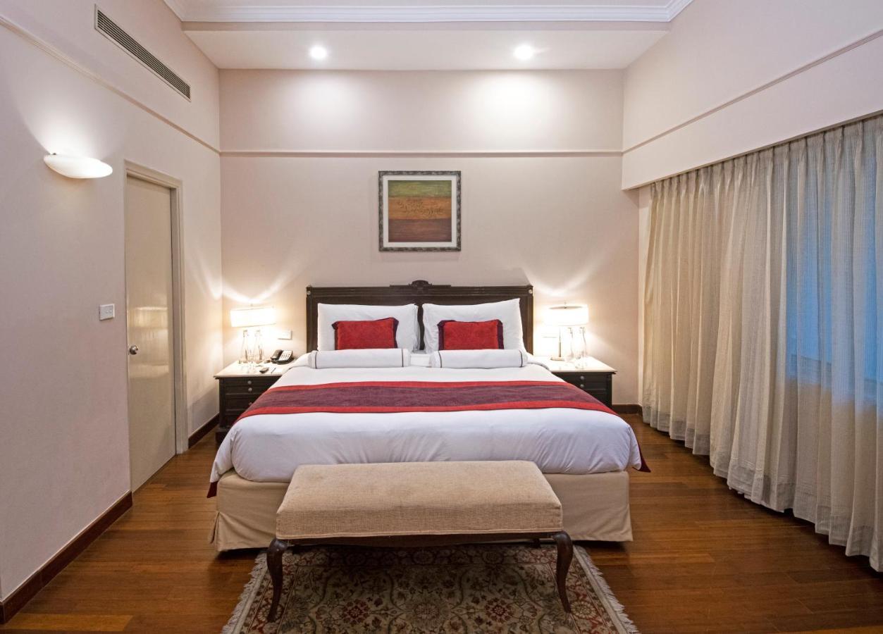 โรงแรมเดอะคลาริดจ์ส นิวเดลี ภายนอก รูปภาพ A bedroom at the Taj Bengal
