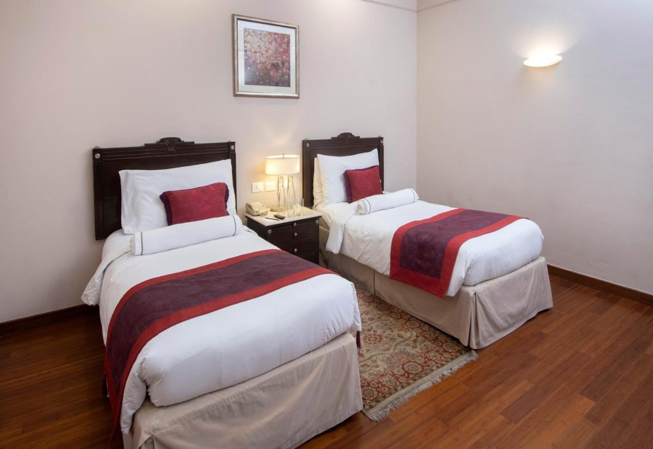โรงแรมเดอะคลาริดจ์ส นิวเดลี ภายนอก รูปภาพ A room at the hotel