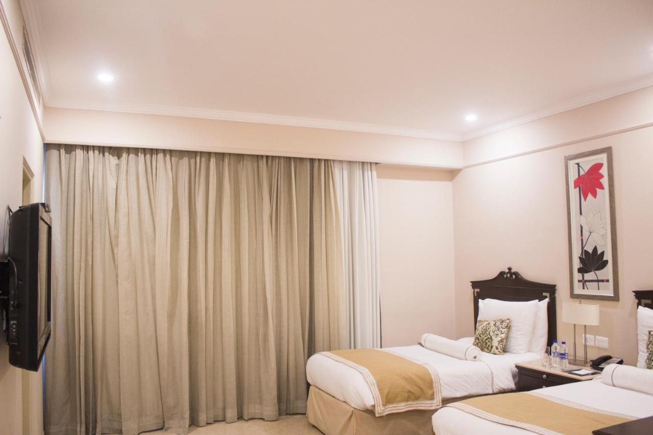 โรงแรมเดอะคลาริดจ์ส นิวเดลี ภายนอก รูปภาพ A room at the Taj Bengal